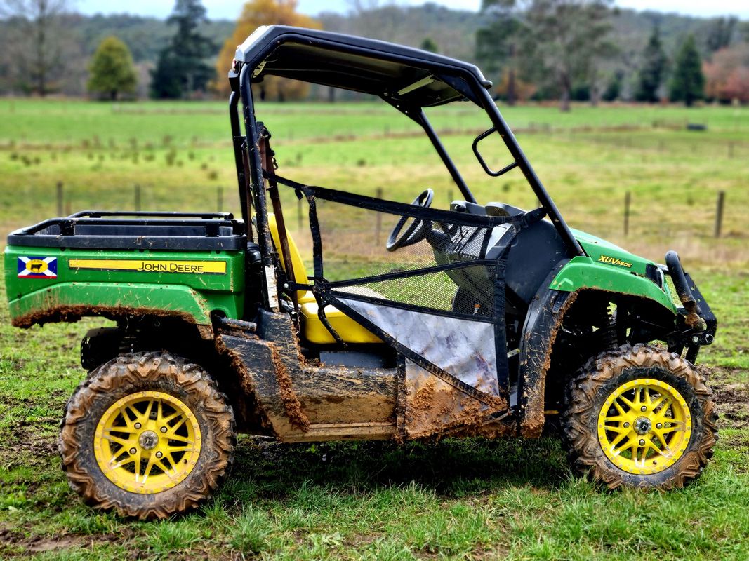 Replacing all Quadbikes, the JD Gator with ROPS handles the winter mud with ease