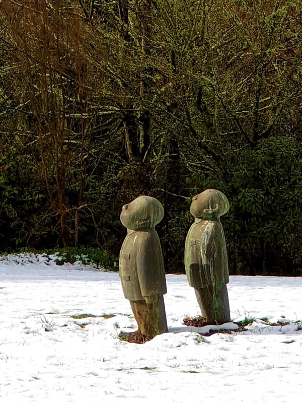 Sunning ones face in the snow, St.Fillan Sculptures